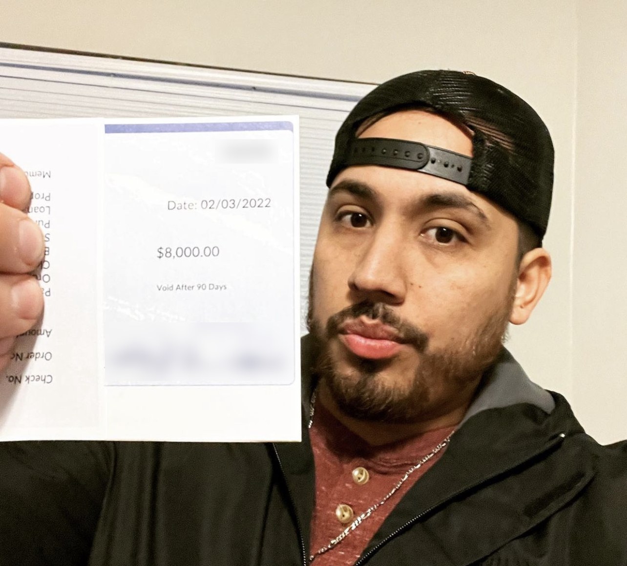 Check for $8,000